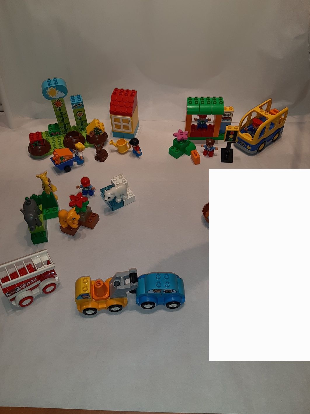 Lego Duplo 5 zestawów zoo,straż,autobus,ogródek,pomoc drogowa