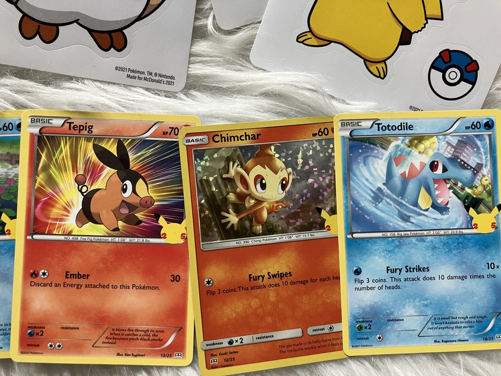 Zestaw. Pokémon. Karty plus naklejki. 11 sztuk