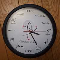 zegar na ścianę, nietypowy, naukowy, czas mierzy w lewą stronę, nowy