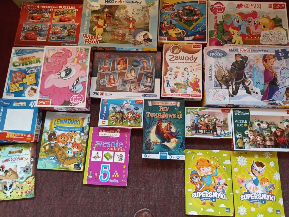 20 książek i 14 puzzli dla małych dzieci stan bdb.