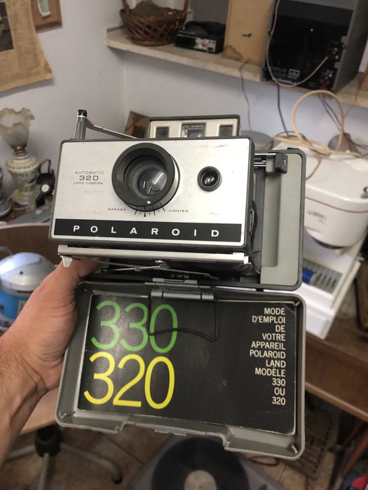 Máquina fotográfica Polaroid 320