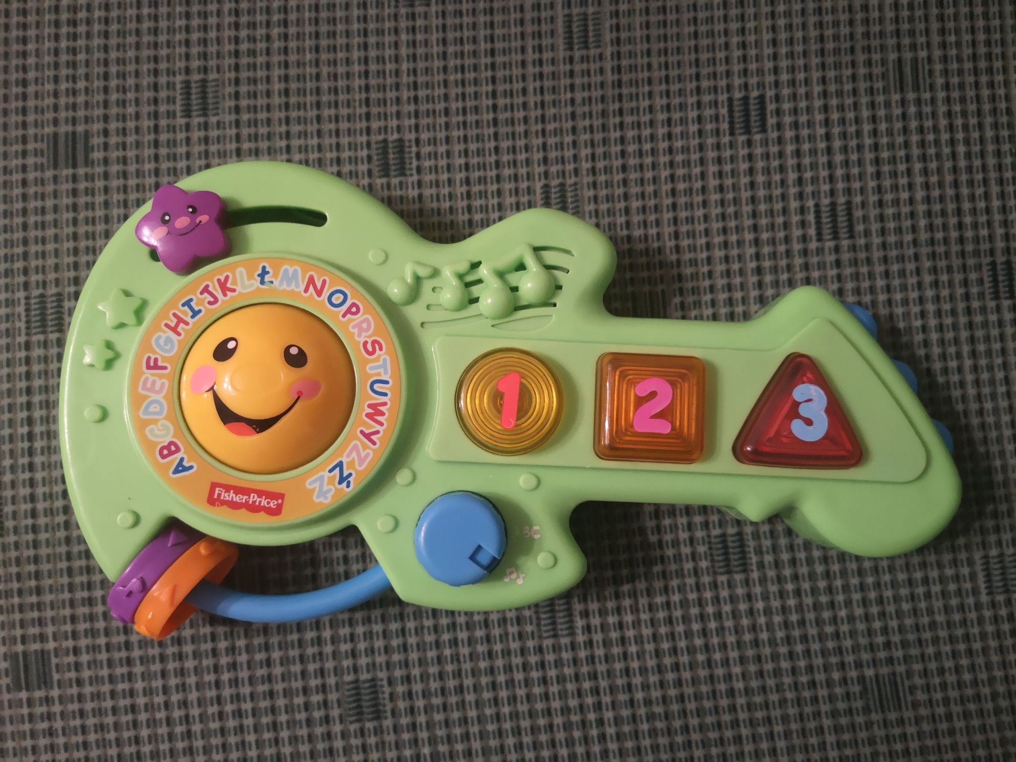 Wesoła gitara Fisher price zabawka grająca edukacyjna dla dzieci