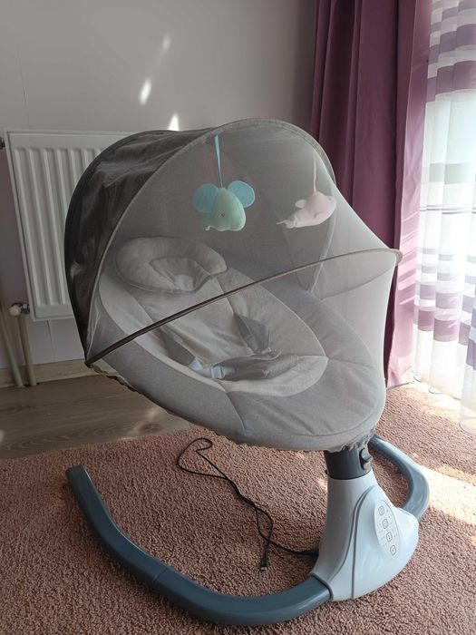 Дитяча електрична гойдалка