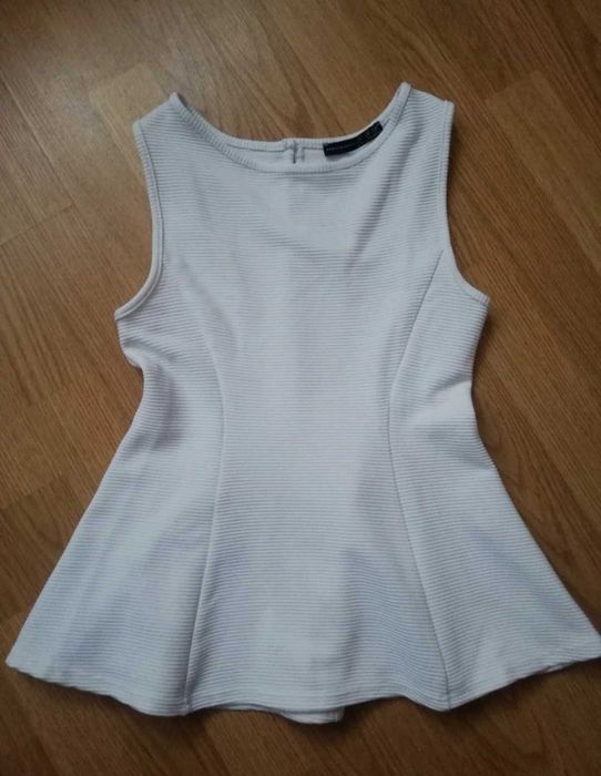 Biała elegancka bluzka bez rękawów Atmosphere