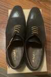 Sapatos pretos novos