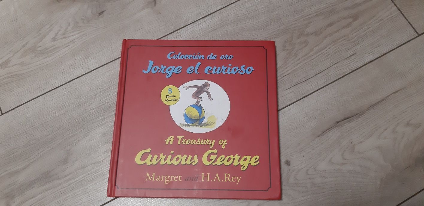 A Treasury of Curious George Книга англійською та іспанською білінгвам