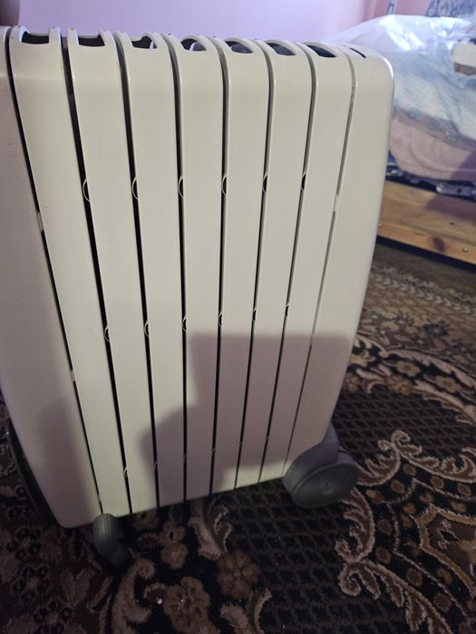 Масляный обогреватель