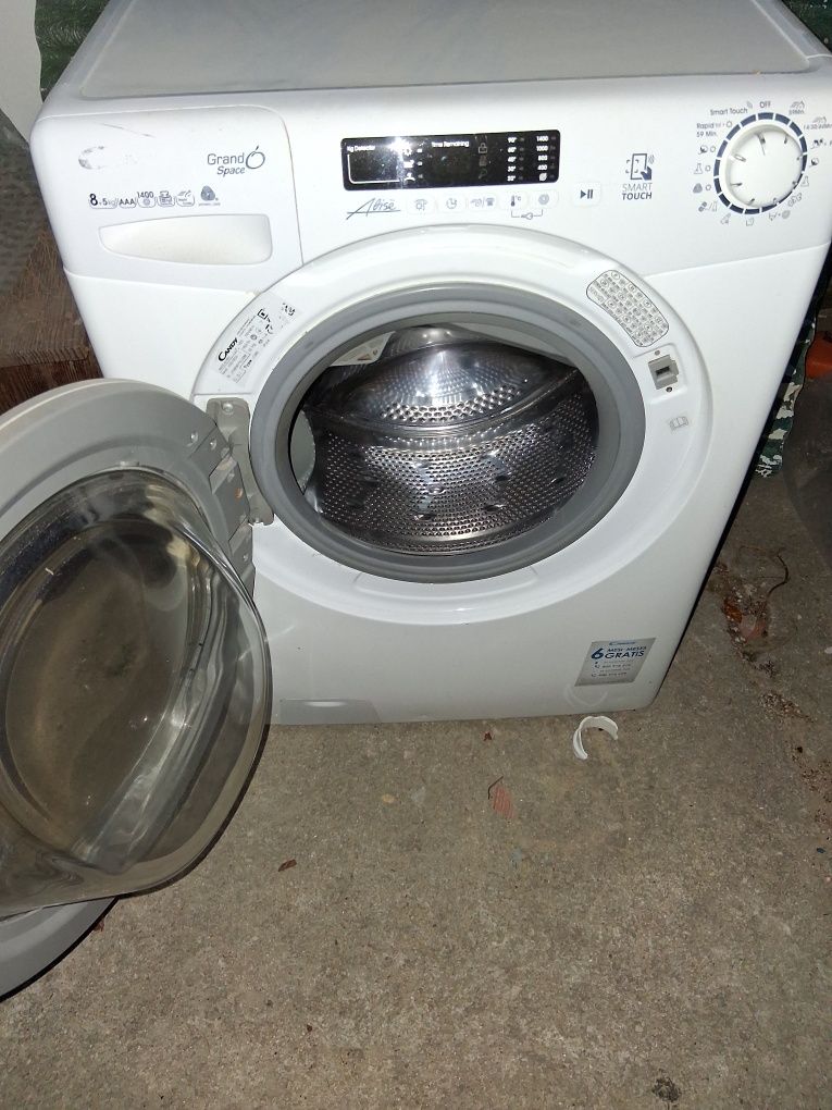 Máquina  de lavar roupa e seca candy7 kl