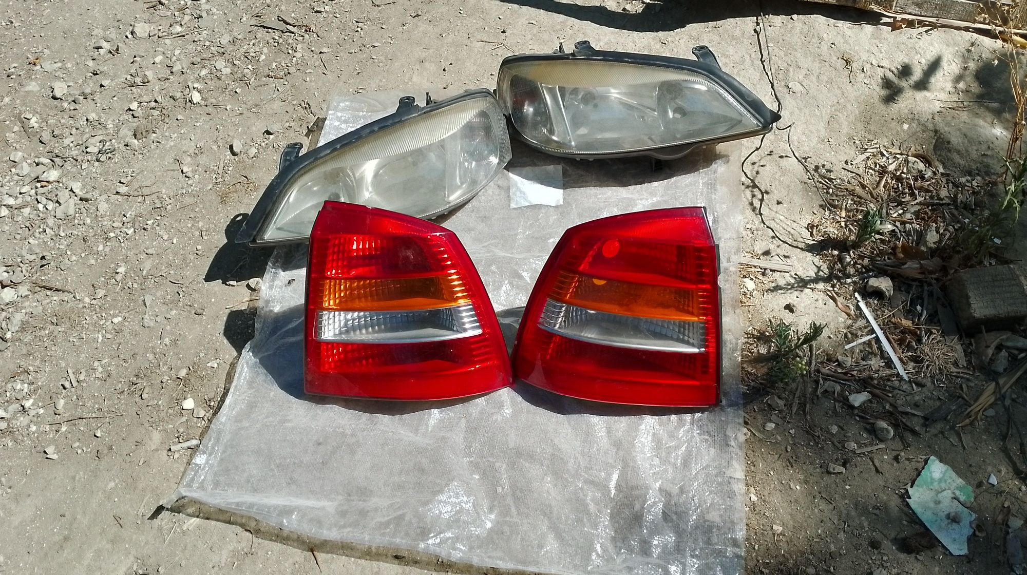 Faróis e pára choques Opel Astra