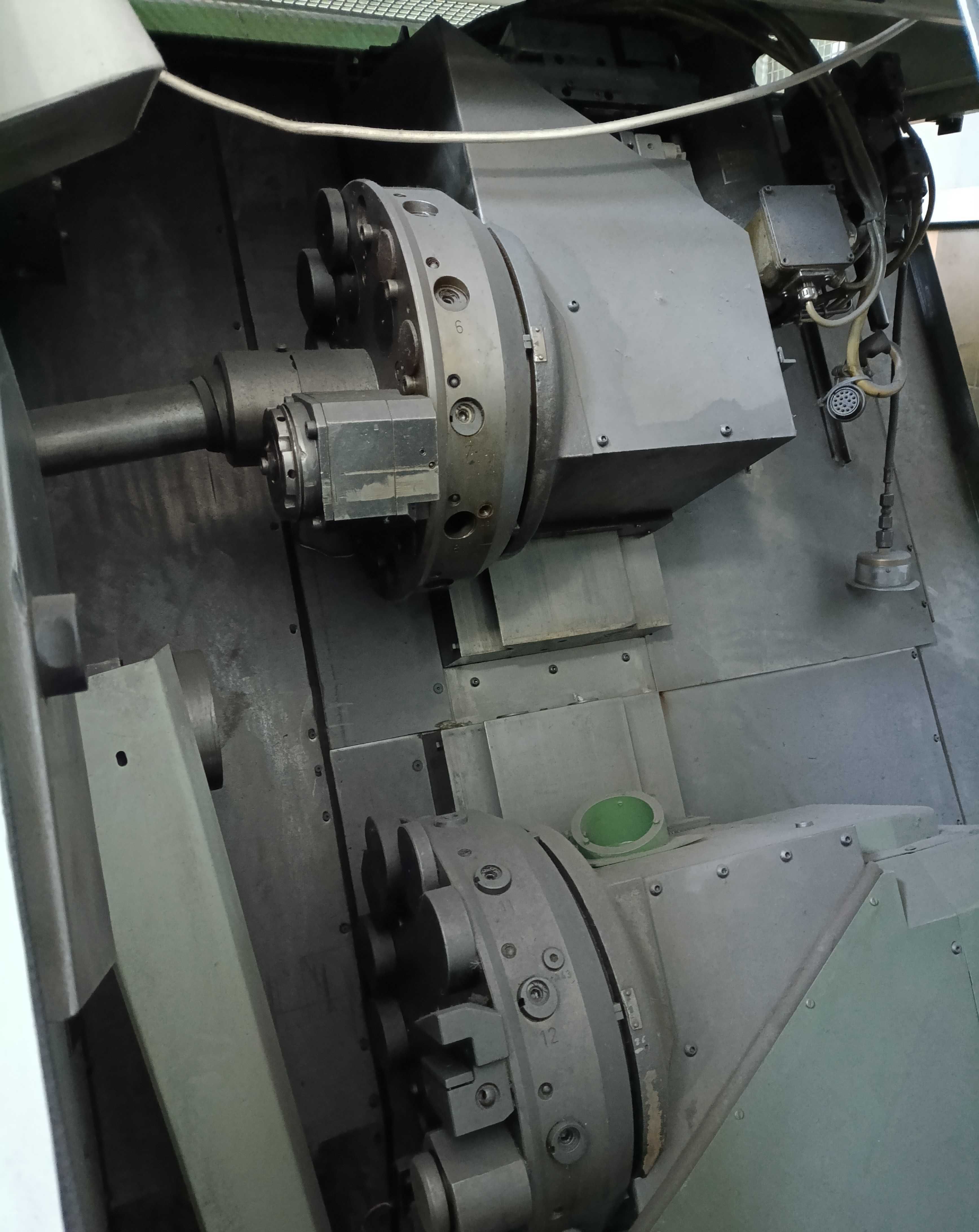 Tokarka CNC TRAUB TNC 30/42D (niesprawna, niekompletna)