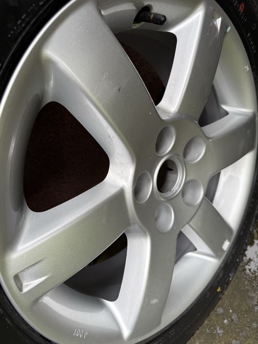 Felga aluminiowa oryginalna z nową oponą do Nissana X-Trail T30