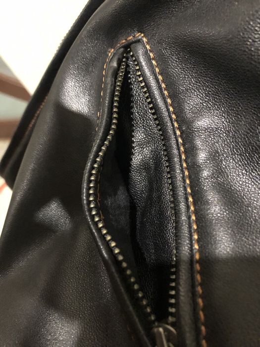 Шкіряна куртка з натуральним хутром