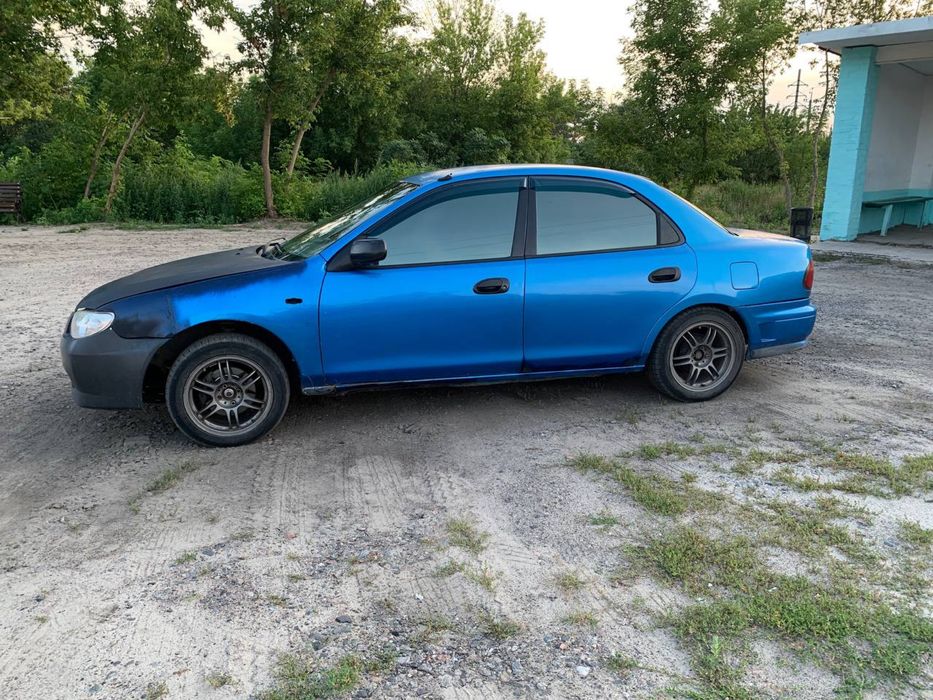 Продам Mazda 323 1.8 1997