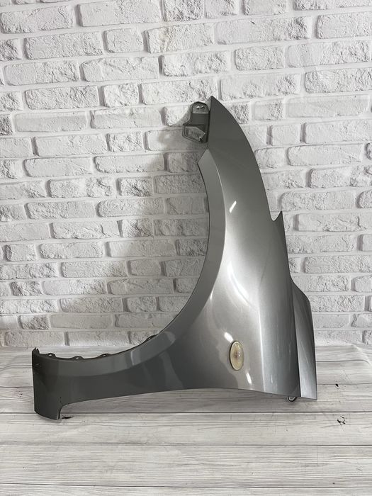 Оригінальне крило Ліве / Праве Suzuki Swift 3 (05-10 р)