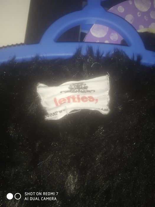 Casaco de pêlo preto