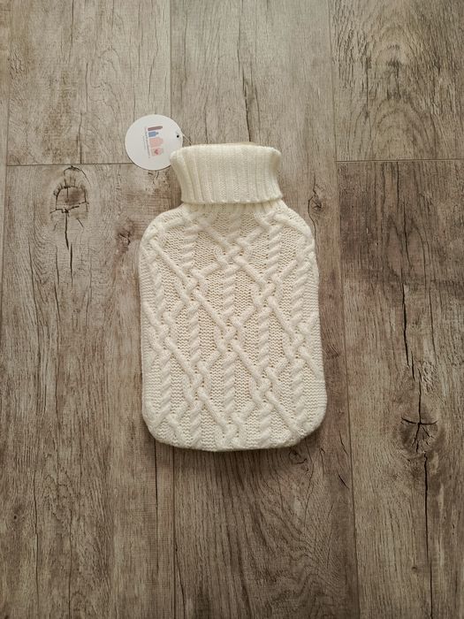 Termofor z kremowym pokrowcem