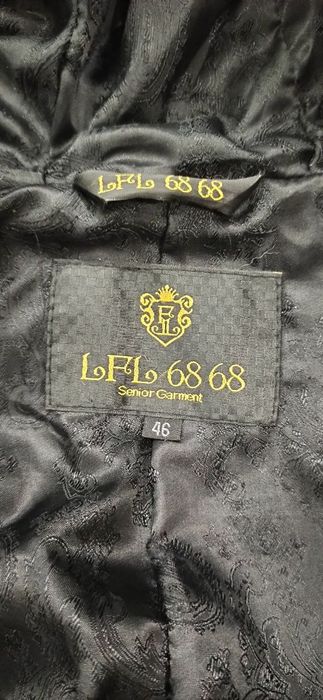 Натуральна, шкіряна куртка/пуховик з натуральним хутром чорнобурки