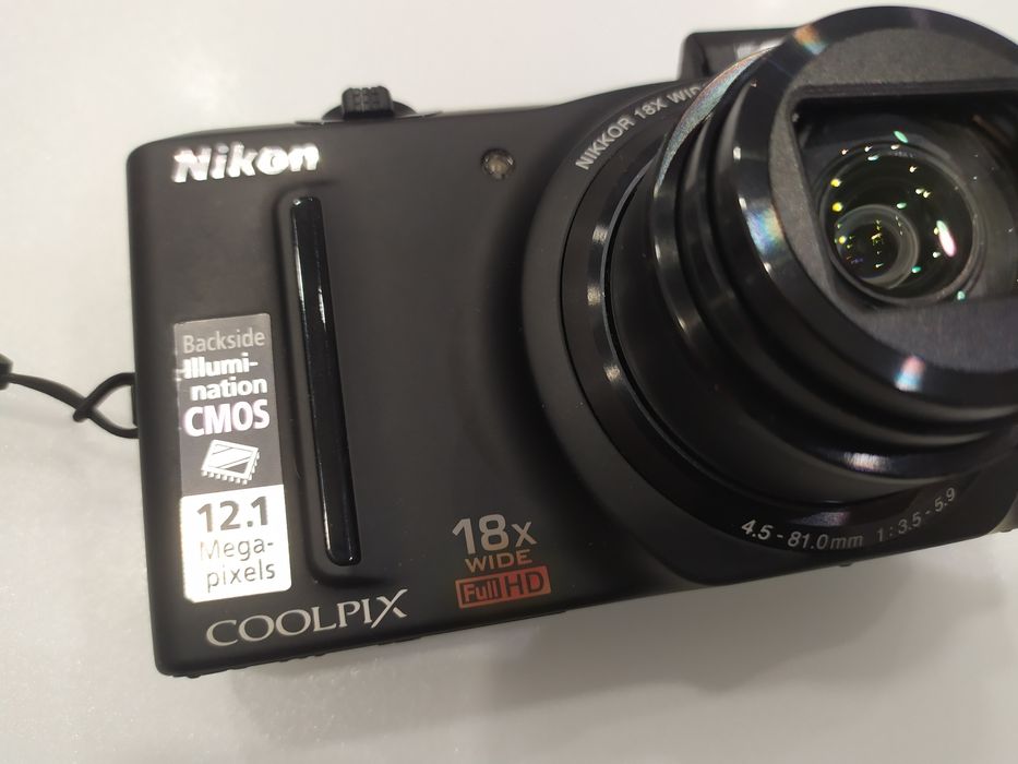 Фотоаппарат NICON COOLPIX S9100 в комплекте 64 гиг карта.