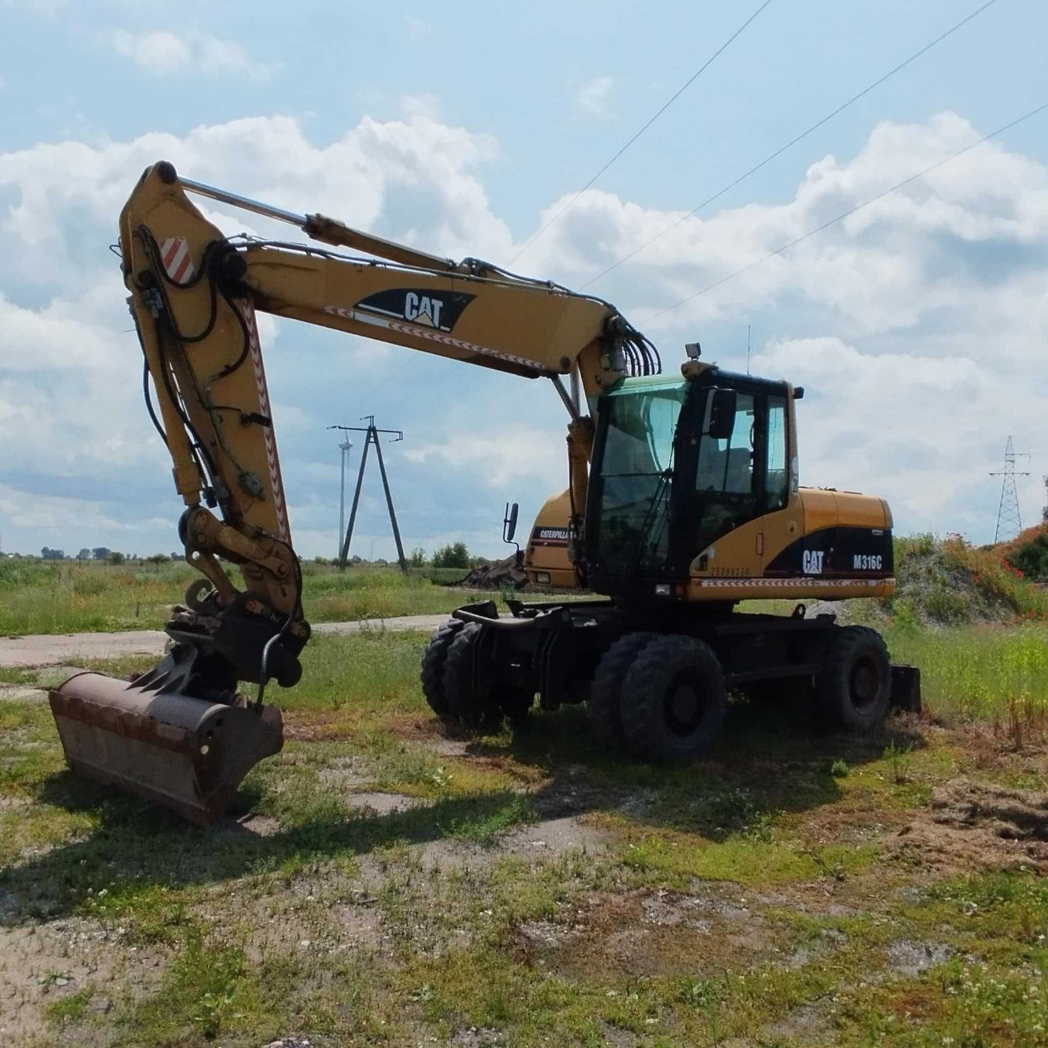 Sprzedam koparkę kołową CATM316C