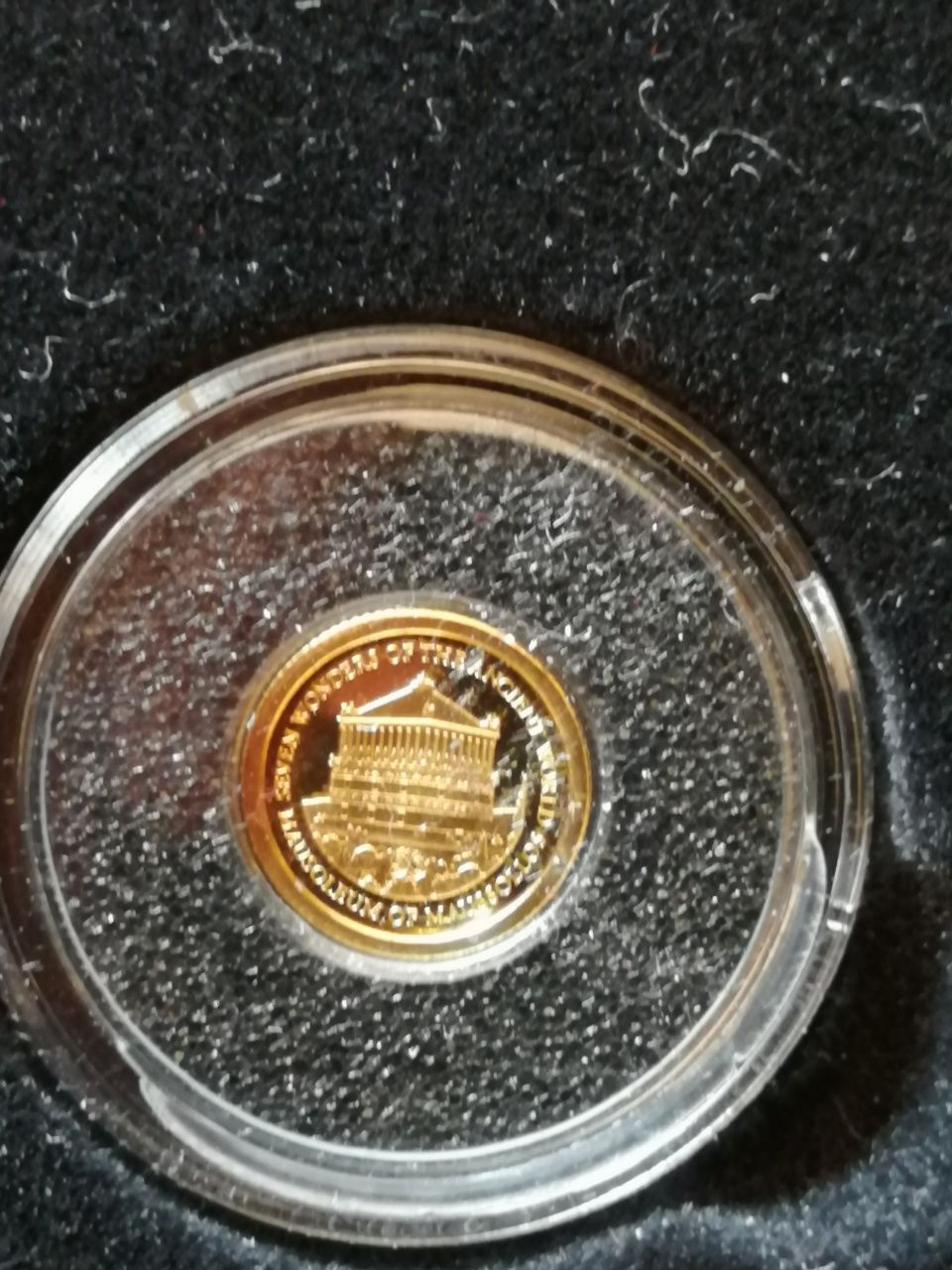 7 szt złotych monet z serii Najmniejsze Monety Świata