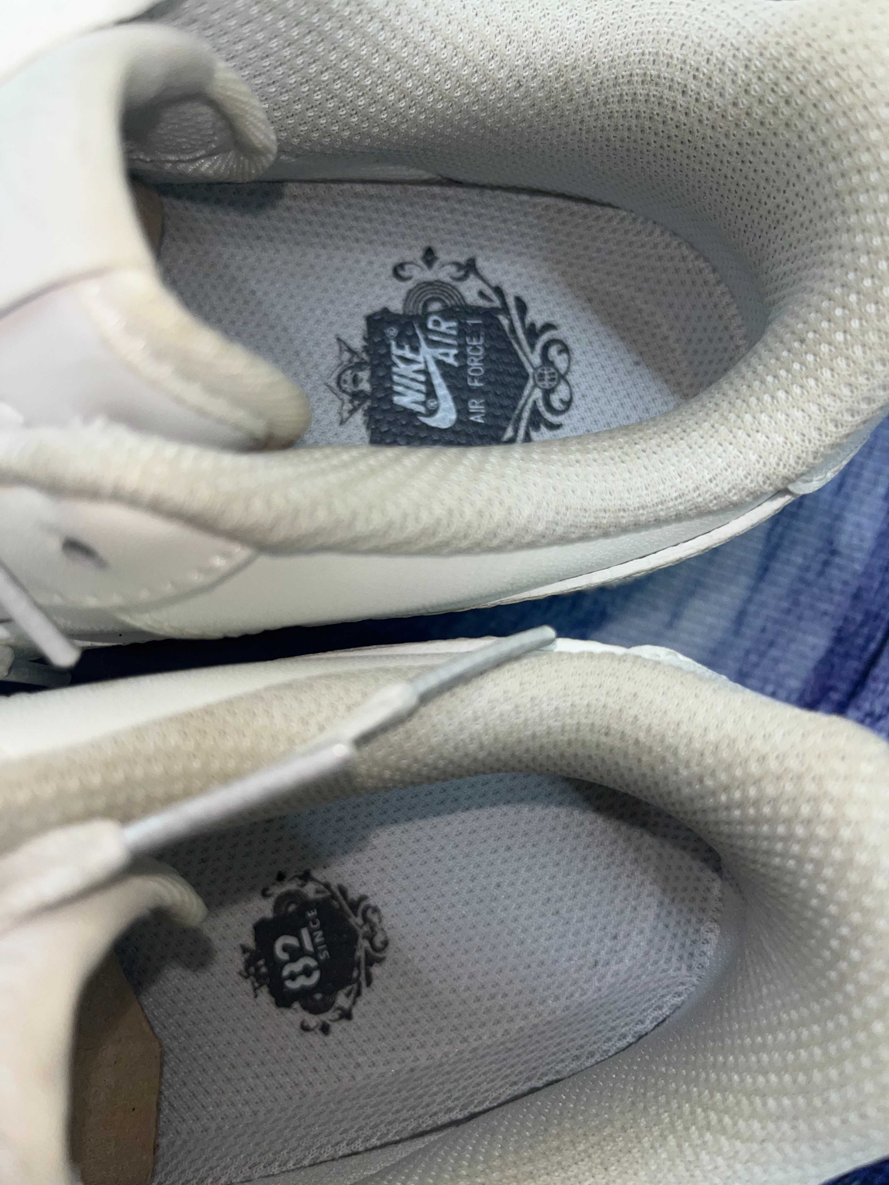 Stylowe, białe tenisówki Nike Air Force 1 w rozmiarze 40
