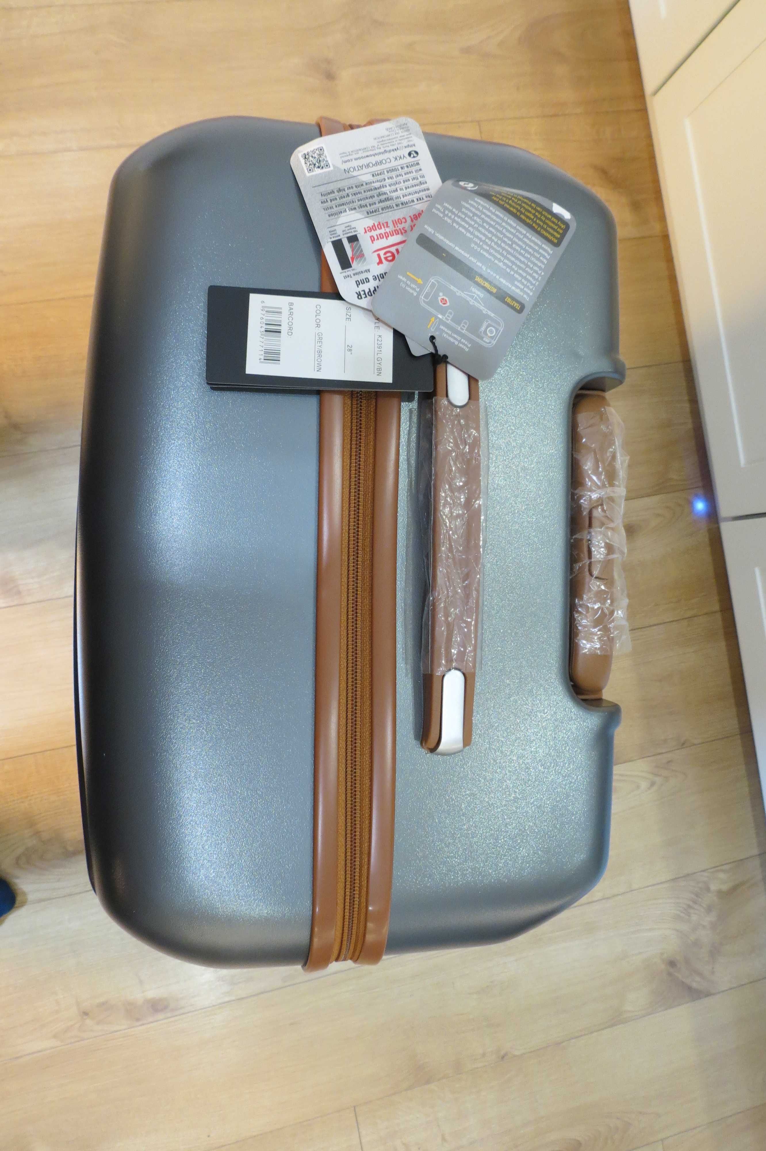 Walizka British Traveller Twarda 74,5cm Srebrna . Bardzo pakowna 91 l