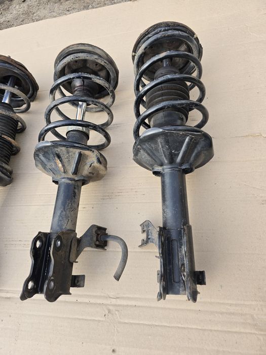 Стойки в сборе Nissan Sunny N14 91-96 левая правая передняя задняя