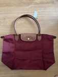 Mala Longchamp bordô tamanho L