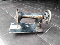 Cabeça de máquina costura