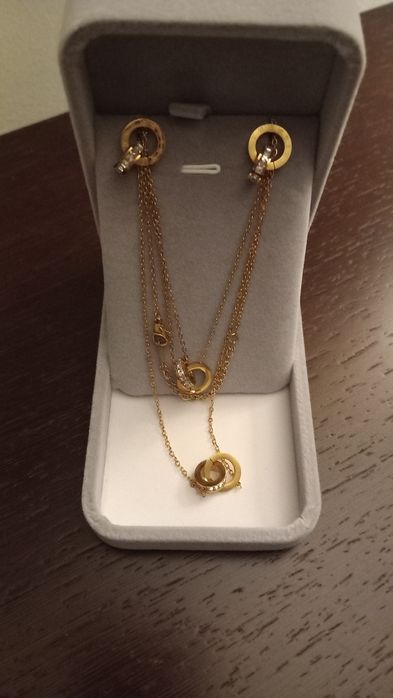 Conjunto de pulseira, brincos e colar em aço