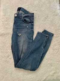 Spodnie jeansy dziury Mohito 34XS