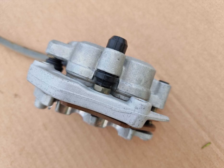 Przód przedni zacisk hamulcowy + przewód Honda CRF 450 stan BDB