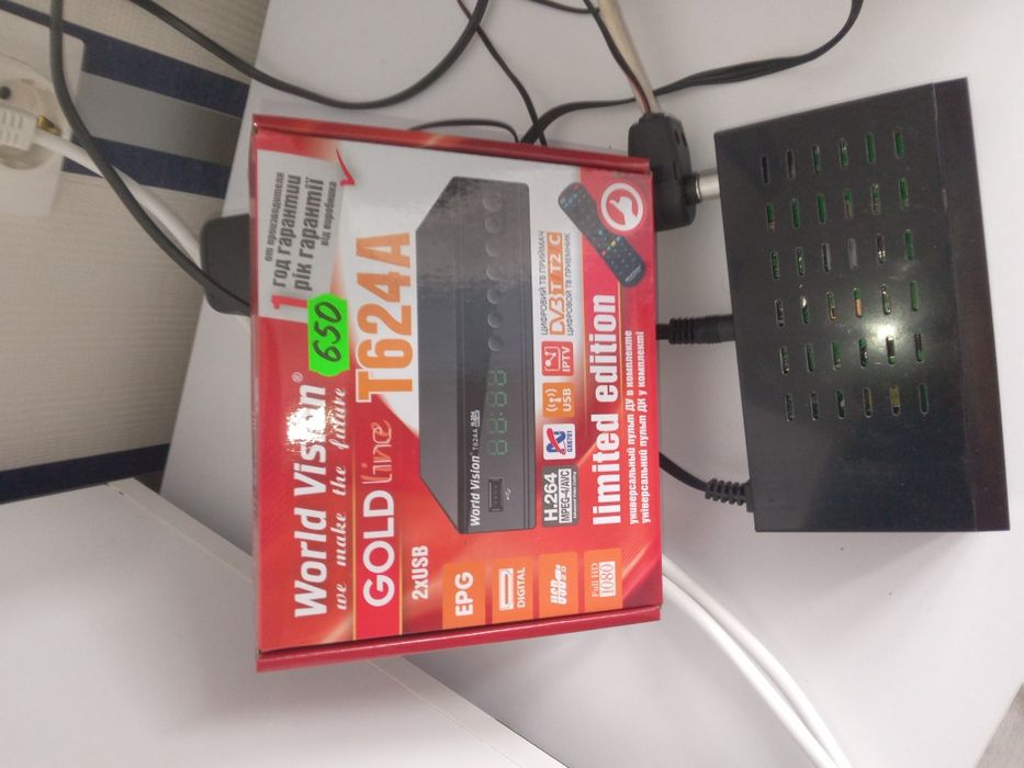 Тюнер новий продам