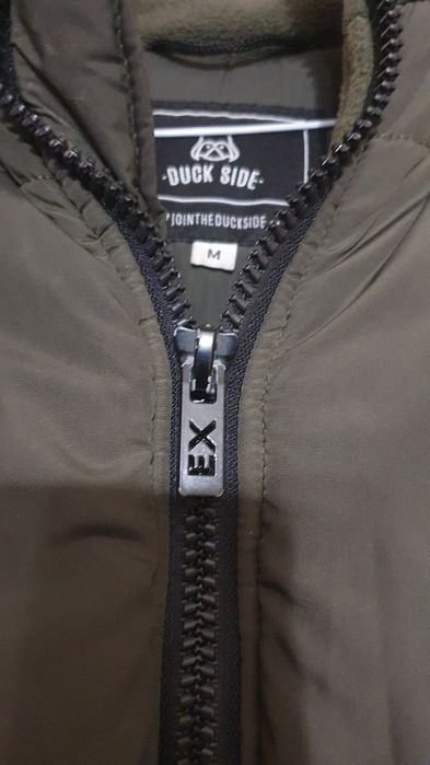 Пуховик жіночий  довгий кольору хакі  утеплений