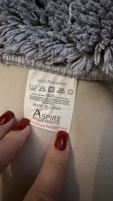 Килимки до ванної кімнати