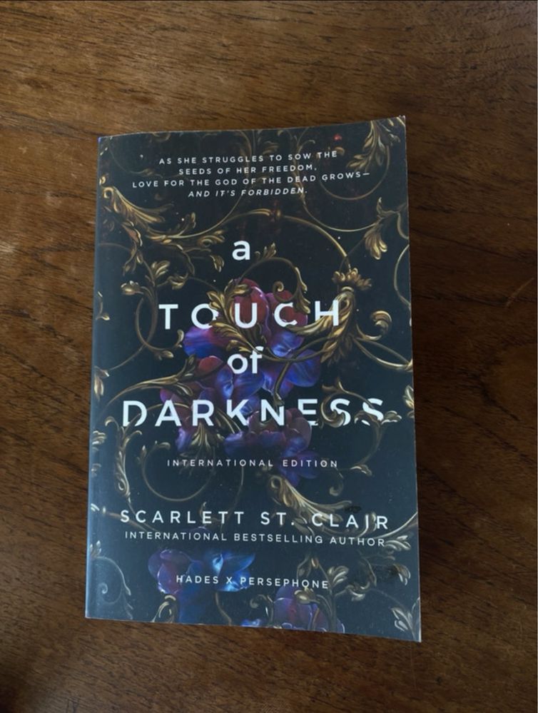 A touch of darkness and a touch of malice by Scarlet st. Clair