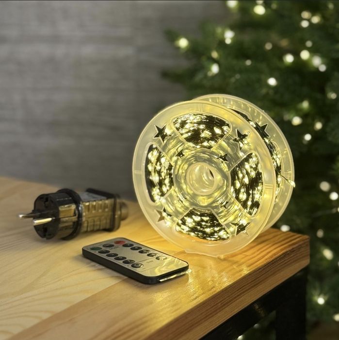 Світлодіодна гірлянда Роса 200 метрів тепле біле світло зелений провід