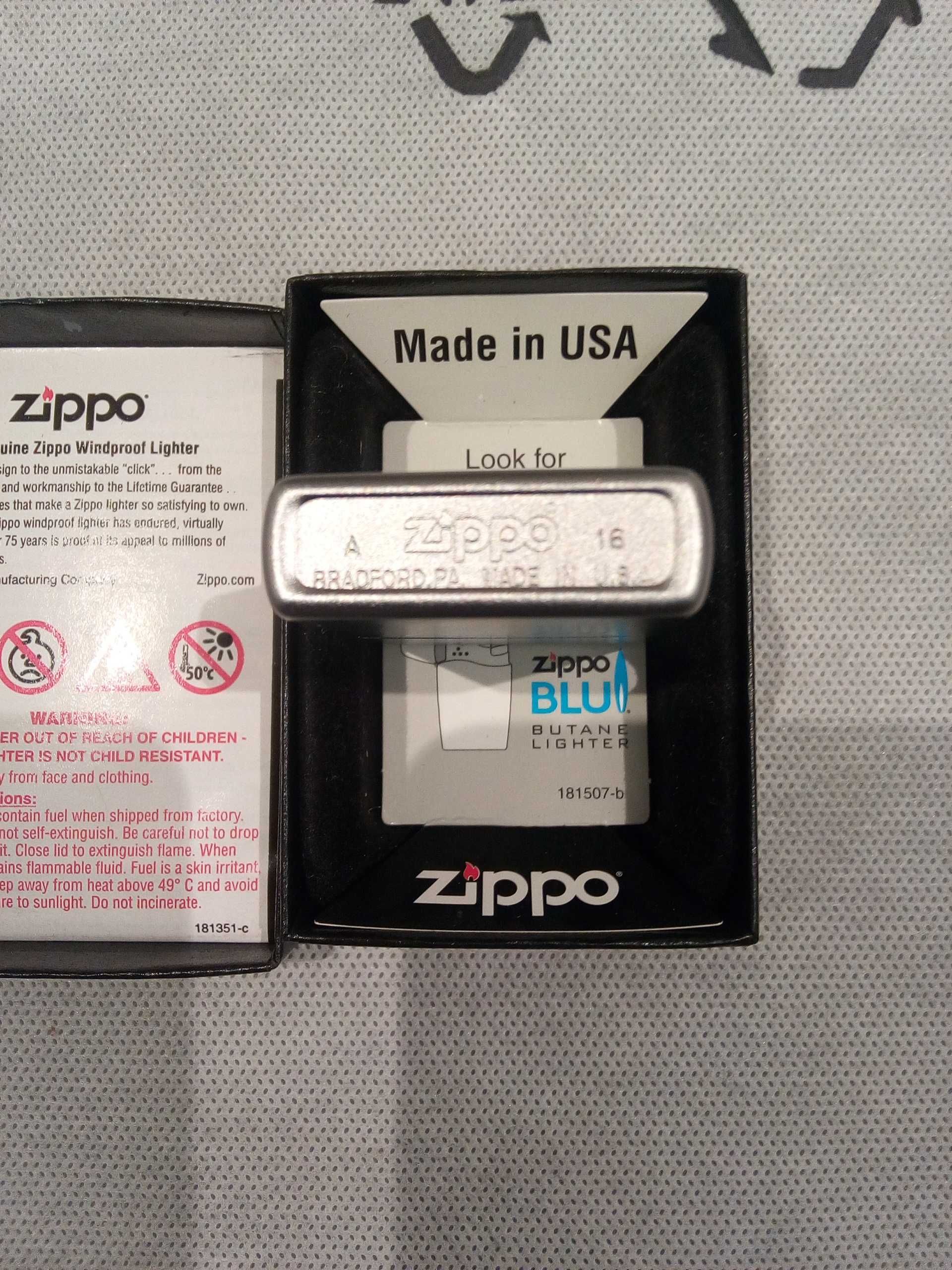 Zippo - оригинальная,новая,надёжная,простая и чуть привлекательная.