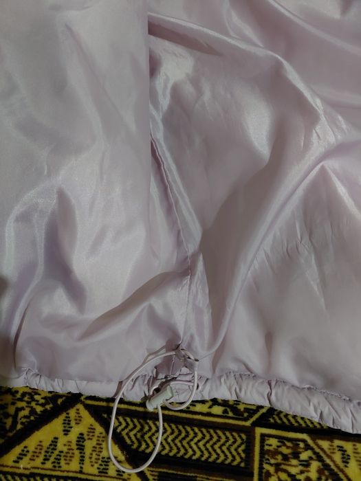 Куртка тепла на сінтіпоні.Бузкового кольору. Яскравіша ніж на фото.З п