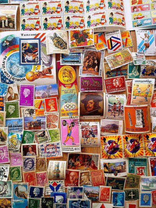 Znaczki pocztowe cały świat 1000szt + 100szt GRATIS