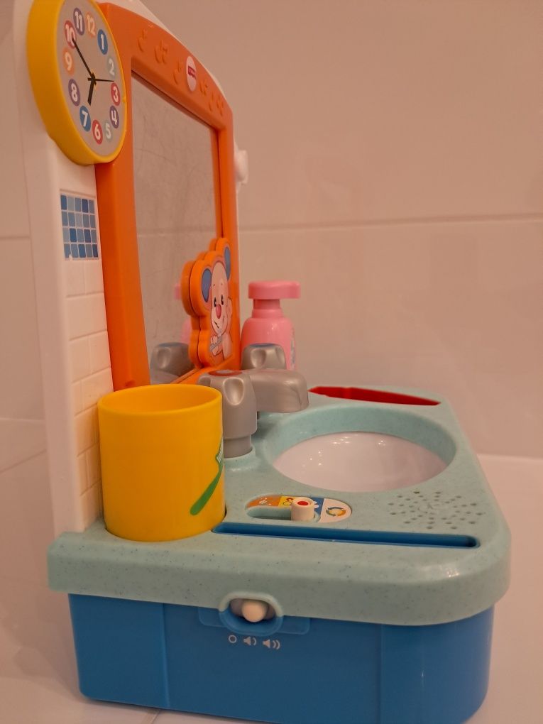 Zabawka interaktywna toaletka Fisher-Price.