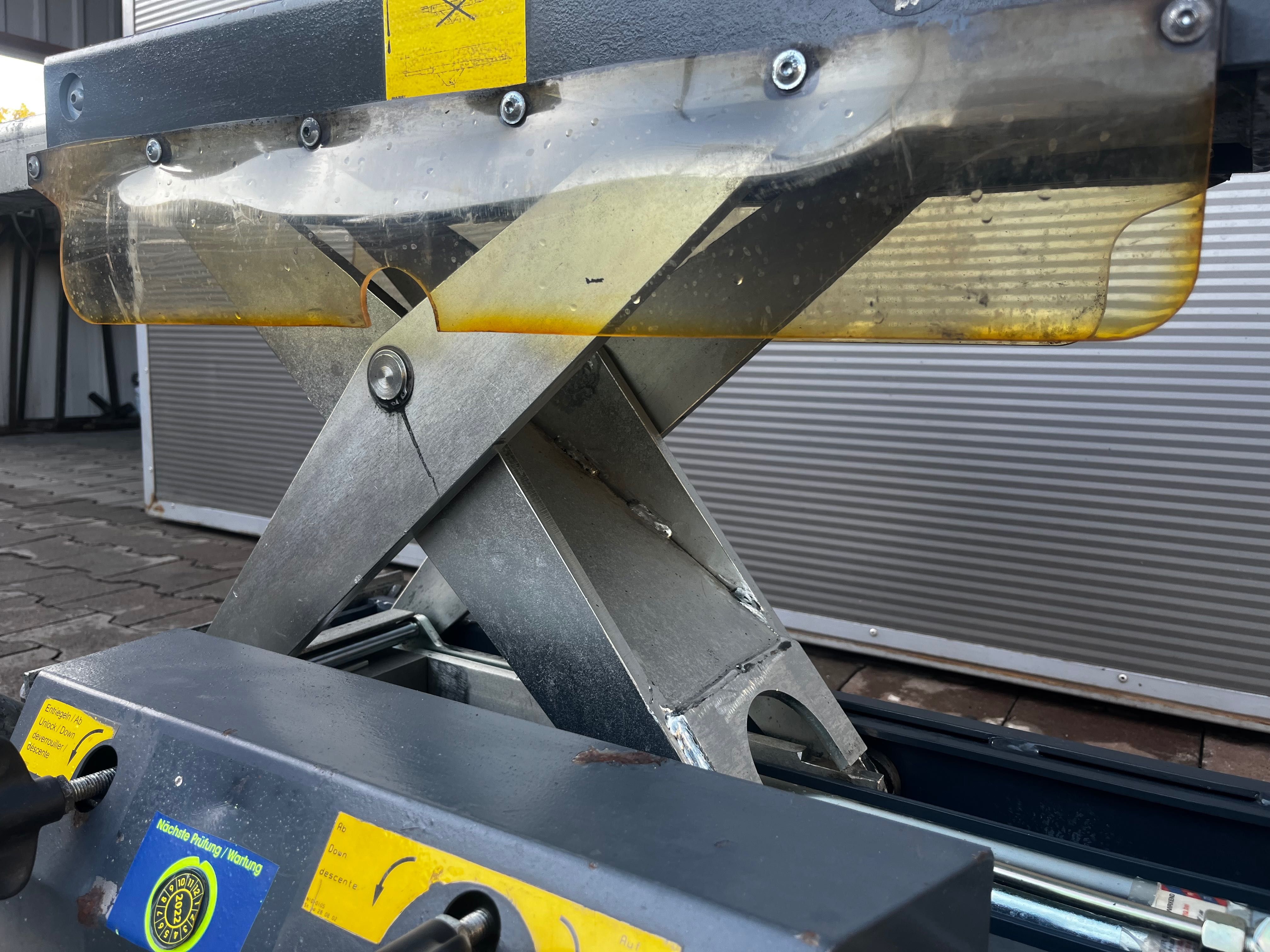 Podnośnik kanałowy pneumatyczno-hydrauliczny Slift 2200 kg
