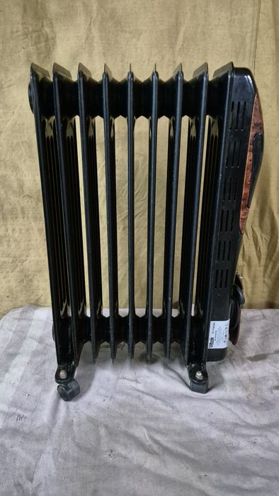 Масляний обігрівач,доставка.чорний