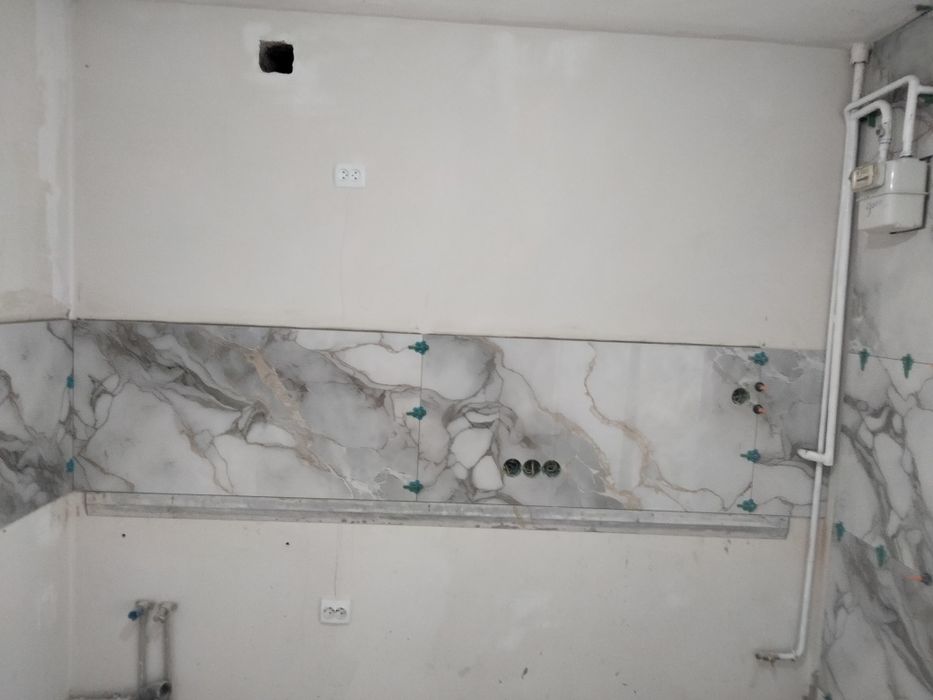 Укладання плитки .