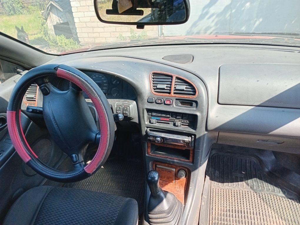 Автомобиль Мазда323f