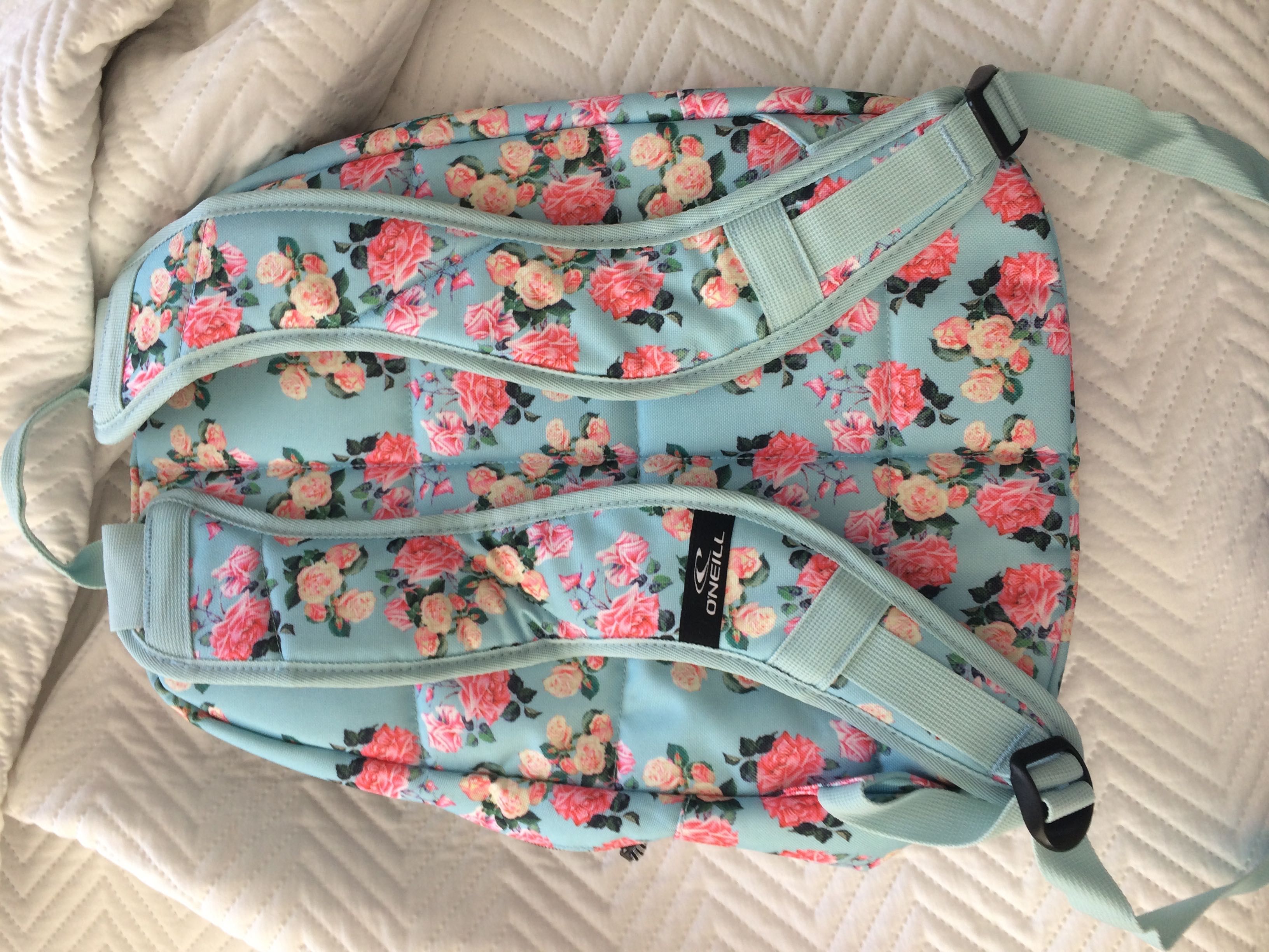 Mochila menina azul com flores rosa da O'neill