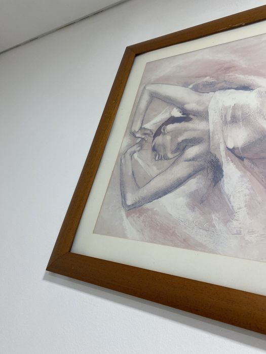 Quadro em muldura de madeira