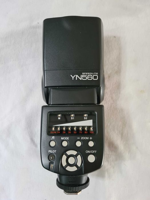 спалах yongnuo 560