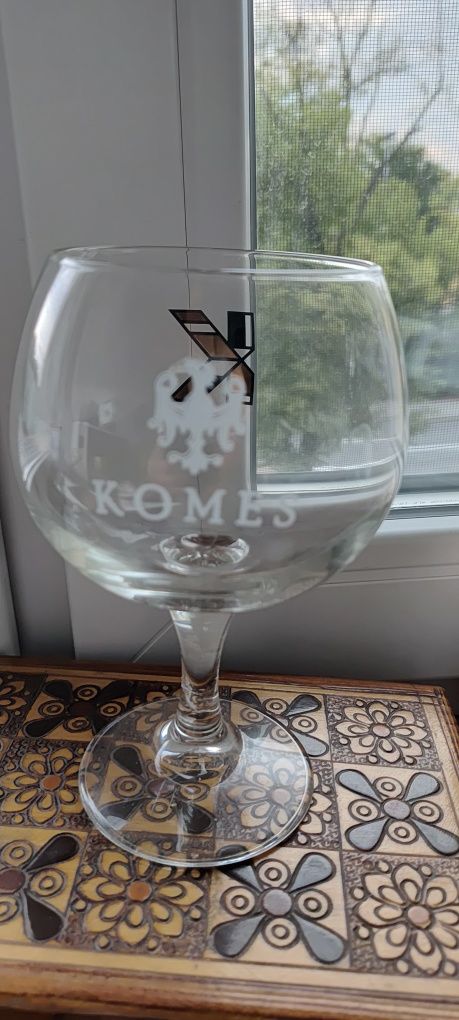 Komes       kufel