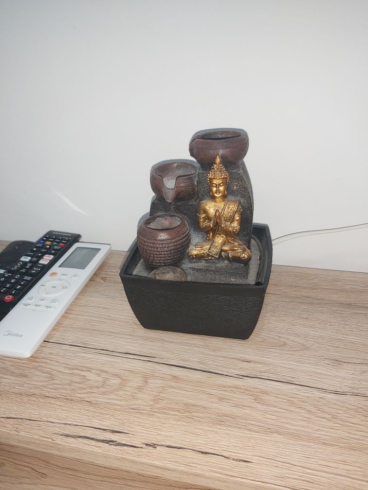 Tela baú e decoração buda